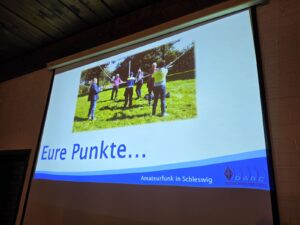 Beamerbild mit Schlussfolie der schleswiger Punkte "Eure Punkte"